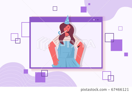 woman in festive hat celebrating online birthday girl in computer window blowing in party blower woman in festive hat celebrating online birthday girl in computer window blowing in party blower 67466121