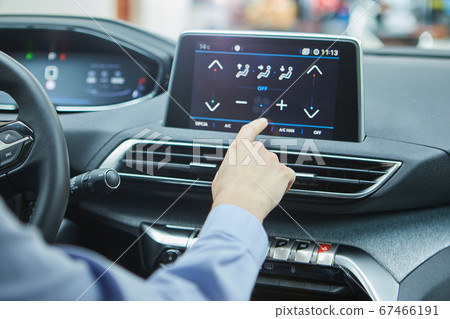 the driver controls the air conditioning in a the driver controls the air conditioning in a 67466191