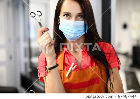 Brunette young woman in room Brunette young woman in room 67467444