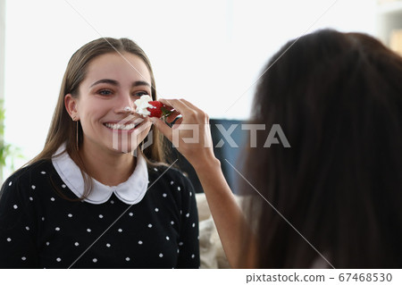 Cute brunette female smiling 67468530