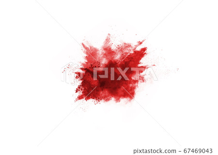 Freeze motion of red powder exploding, isolated on white background. Abstract design of red dust cloud. Particles explosion screen saver, wallpaper 67469043