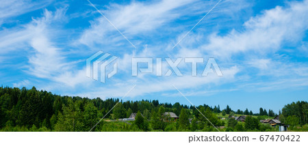 wooden houses on hillside with cloudy sky wooden houses on hillside with cloudy sky 67470422