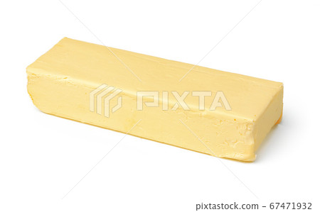 Block of butter isolated on white background Block of butter isolated on white background 67471932