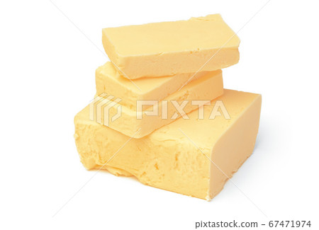 Block of butter isolated on white background Block of butter isolated on white background 67471974