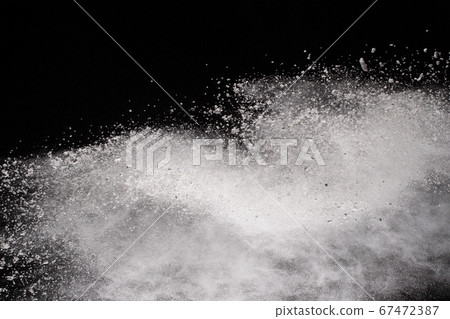 White powder explosion on black background. Colored cloud. Colorful dust explode. Paint Holi. 67472387
