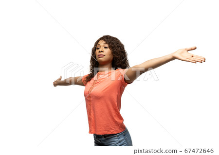Young african-american woman with funny, unusual popular emotions and gestures isolated on white studio background Young african-american woman with funny, unusual popular emotions and gestures isolated on white studio background 67472646