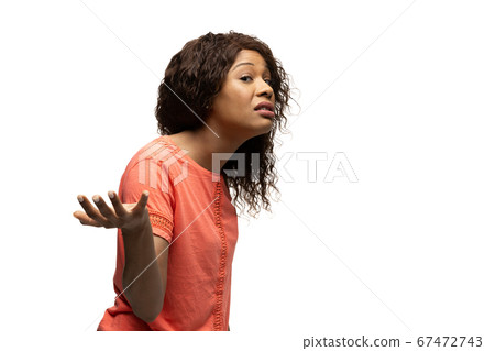 Young african-american woman with funny, unusual popular emotions and gestures isolated on white studio background 67472743