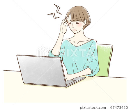 Woman suffering from headache in front of personal computer 67473430
