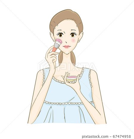 Woman applying a cheek with a brush Woman applying a cheek with a brush 67474958