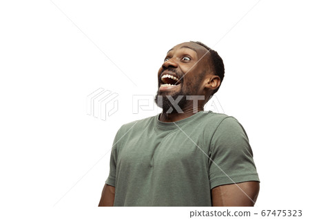 Young african-american man with funny, unusual popular emotions and gestures isolated on white studio background 67475323