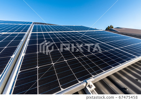 New solar panels on house roof New solar panels on house roof 67475458
