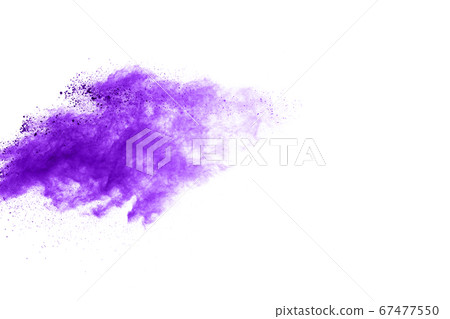 Powder explosion. Closeup of a purple dust particle explosion isolated on white. Abstract background. 67477550