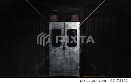 closed retro iron door on classic exterior 67478162