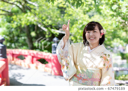 Portrait of a woman wearing a kimono Portrait of a woman wearing a kimono 67479189