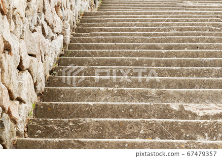 Old marching stairs with close-up. As a background. Old marching stairs with close-up. As a background. 67479357