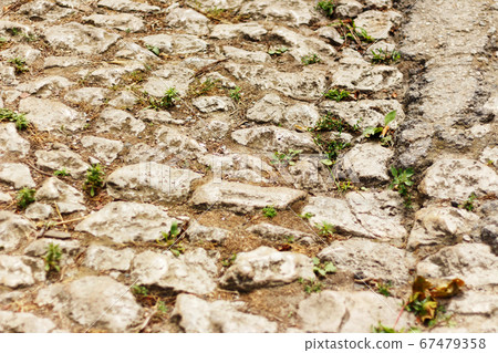Old vintage paving stones as background. As a background. Old vintage paving stones as background. As a background. 67479358