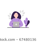 Woman sitting at the desk and working at her laptop 67480136