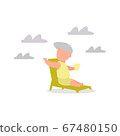 A man lying on th elounger at the beach and having a drink 67480150