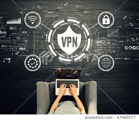 VPN concept with person using a laptop VPN concept with person using a laptop 67480577