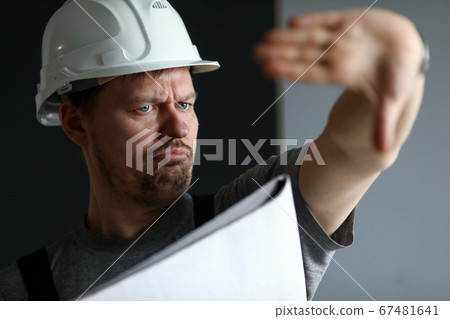Serious handy foreman at work 67481641
