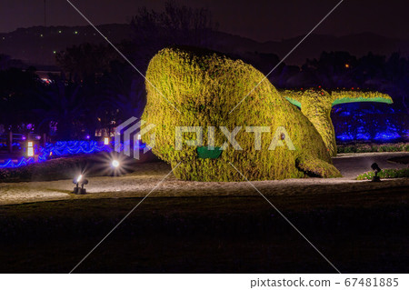 Night view of a whale shape structure with plants 67481885