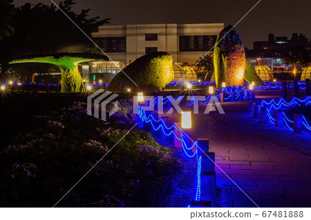 Night view of a whale shape structure with plants 67481888