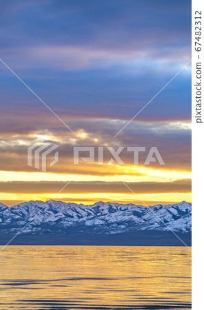 Square Panoramic view of a shiny lake and mountain 67482312