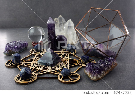 Crystals for healing, fortune telling and astrologhy on dark background. Esoteric and life coaching concept. Crystals for healing, fortune telling and astrologhy on dark background. Esoteric and life coaching concept. 67482735