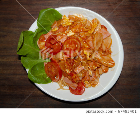 Pasta fried with tomato sauce Pasta fried with tomato sauce 67483401