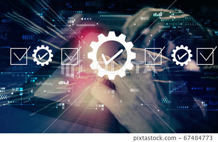 Quality control approval with man using tablet 67484773