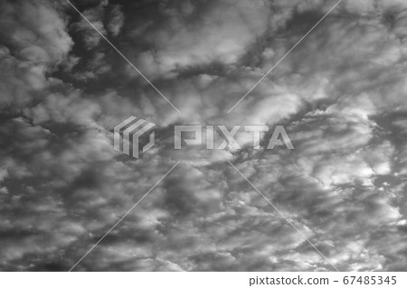 Altocumulus clouds. Black and white. Altocumulus clouds. Black and white. 67485345