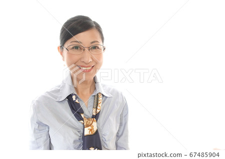 Smiling businesswoman with glasses Smiling businesswoman with glasses 67485904