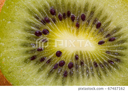 Kiwi fruit cutaway. Food macro shot. 67487162