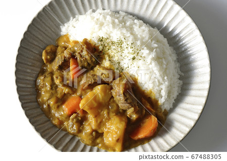 Curry and rice with plenty of vegetables and beef tenderloin photographed on a white background (overview) Curry and rice with plenty of vegetables and beef tenderloin photographed on a white background (overview) 67488305