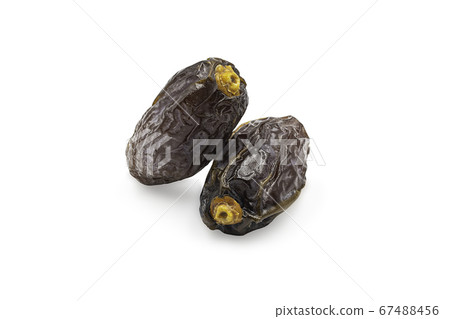Dried Medjoul date fruit on white isolated 67488456
