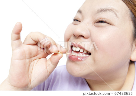 Woman after meal Woman after meal 67488655