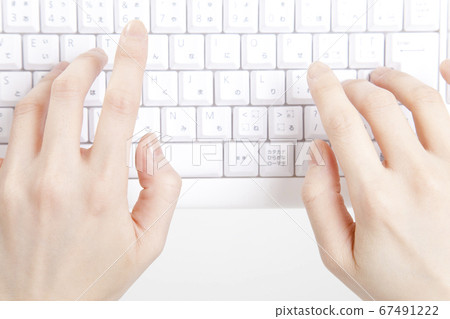 A woman's hand hitting the keyboard 67491222