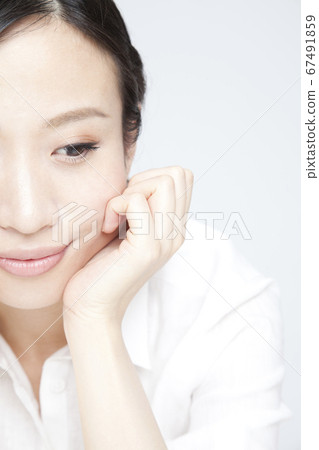 A lady with a cheeks stick A lady with a cheeks stick 67491859