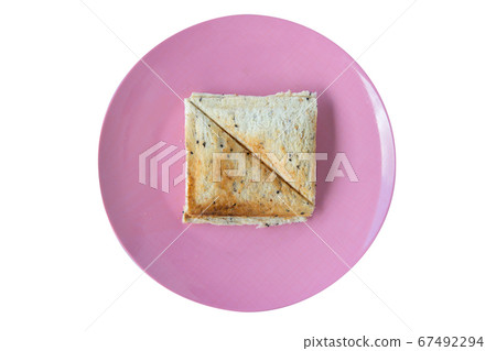 Baked sandwich with whole wheat bread on pink Baked sandwich with whole wheat bread on pink 67492294