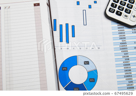 business office desk closeup - financial reports, 67495629