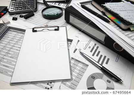 business office desk closeup - financial reports, 67495664