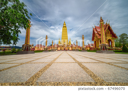 The scenery of the Wat Bang Thong temple (golden pagoda) at Krabi province, Thailand. The scenery of the Wat Bang Thong temple (golden pagoda) at Krabi province, Thailand. 67496070
