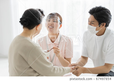Nursing staff wearing masks and face shields 67497854