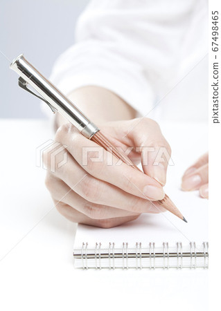 Hand to take notes Hand to take notes 67498465