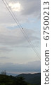 A wife waits for her husband at sunset. 67500213