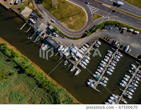Yacht parking in marina aerial top view of boats Yacht parking in marina aerial top view of boats 67500670