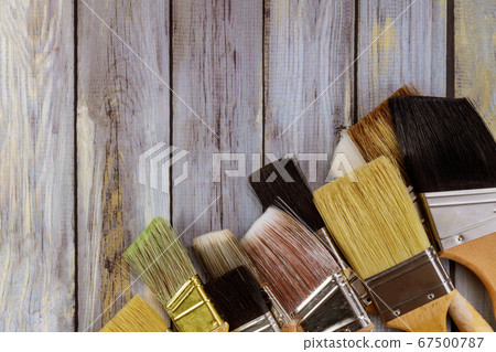 Various paint tools brush on white wooden table Various paint tools brush on white wooden table 67500787