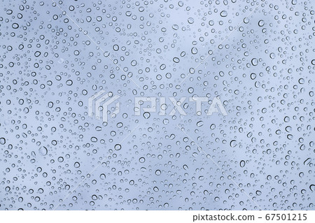 Beautiful water drops on the glass Raindrops on the windshield of a car Beautiful water drops on the glass Raindrops on the windshield of a car 67501215