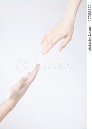 Men and women reaching 67502272