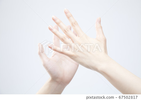 Male and female hands with high touch 67502817